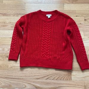 Red cable knit sweater